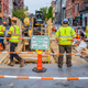Image for article titled Report: Majority Of Men In Hard Hat, Coveralls Actually Members Of Heist Team In Disguise